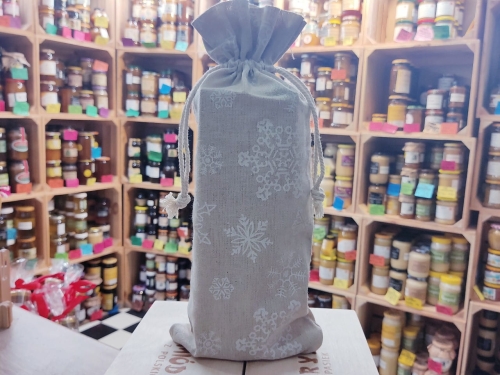 W woreczku śnieżynkowym duży miód mniszkowy oraz mały miód Iglasto-Liściasty z Pienin